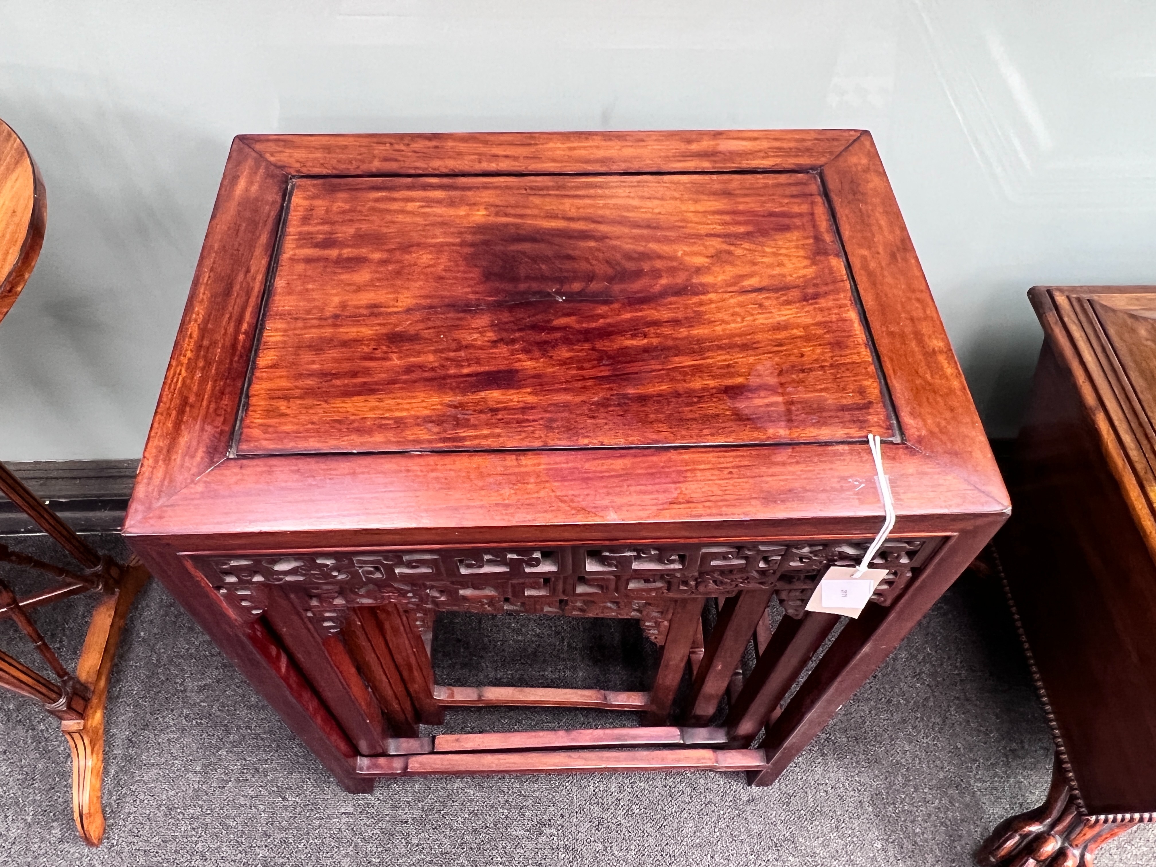A Chinese hardwood quartetto of tea tables, width 50cm, depth 35cm, height 65cm